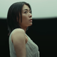Singer Hikaru Utada looks off-camera in a still from YouTube.